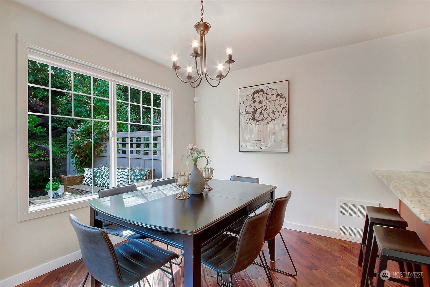 530 Elma Place Northeast Renton, WA 98059 - Photo 10 of 32 a view of a dining room with furniture window and wooden floor