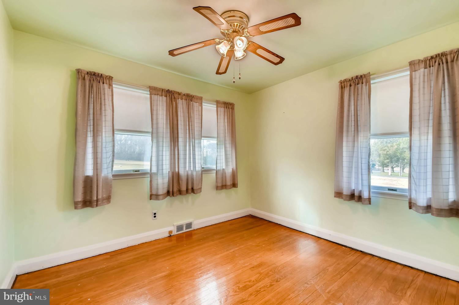 10403 Vincent Road White Marsh, MD 21162 - Photo 16 of 27 Third Bedroom w/hardwood flooring