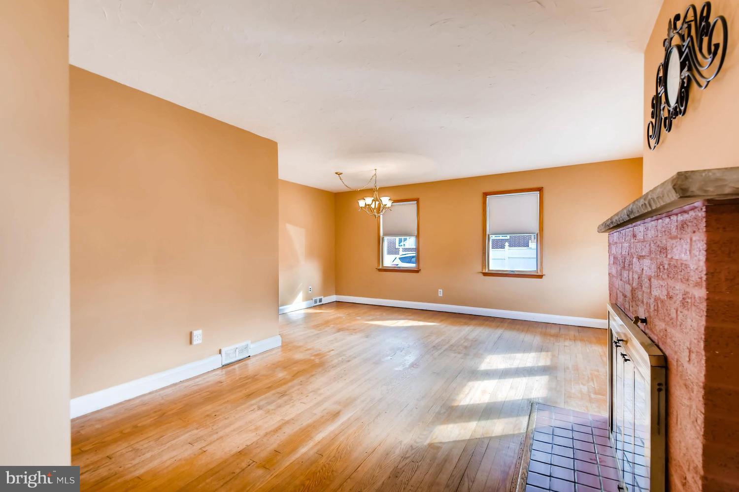 10403 Vincent Road White Marsh, MD 21162 - Photo 6 of 27 Living/Dining combo w/ fireplace