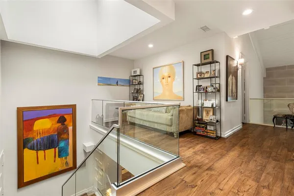 a spacious bedroom with a bed and window