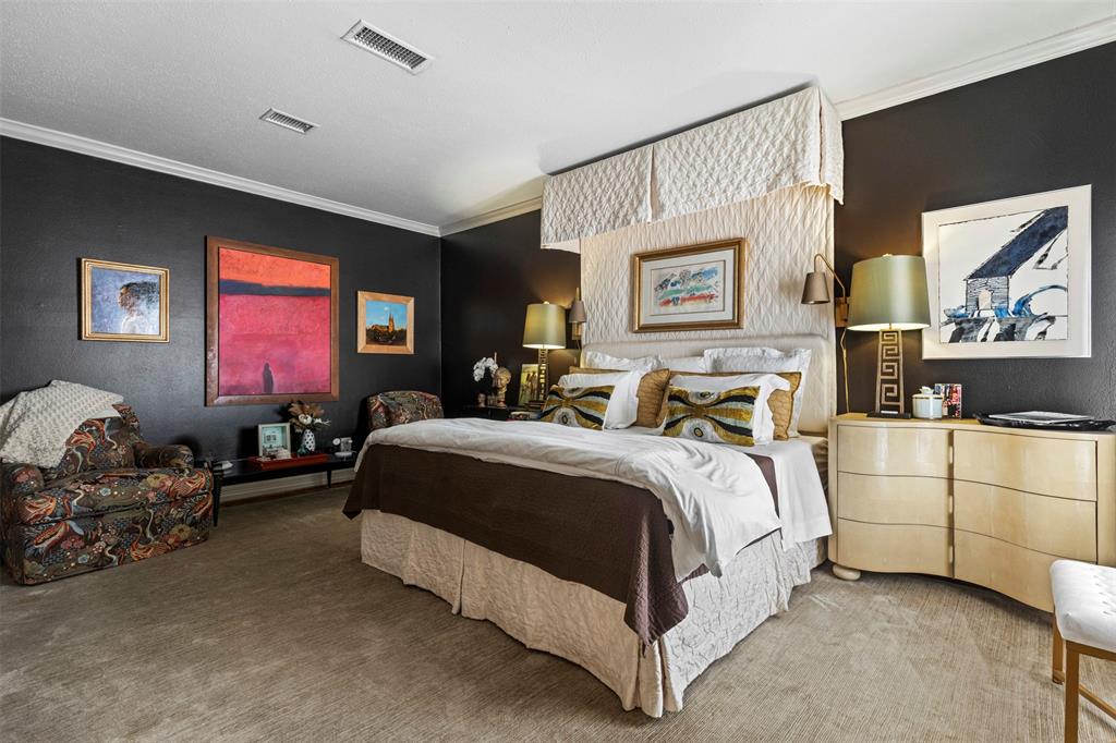3424 Gillespie Street, Unit 5 Dallas, TX 75219 - Photo 17 of 31 a spacious bedroom with a bed and window