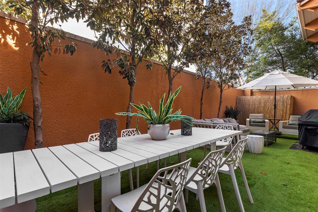 3424 Gillespie Street, Unit 5 Dallas, TX 75219 - Photo 27 of 31 a view of an outdoor space with patio