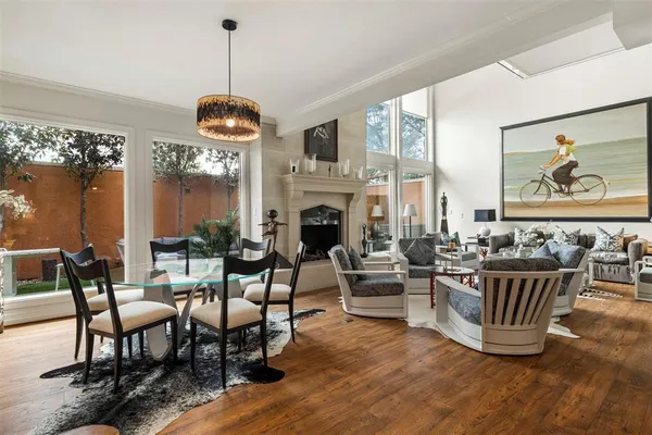 a dining room with furniture and window