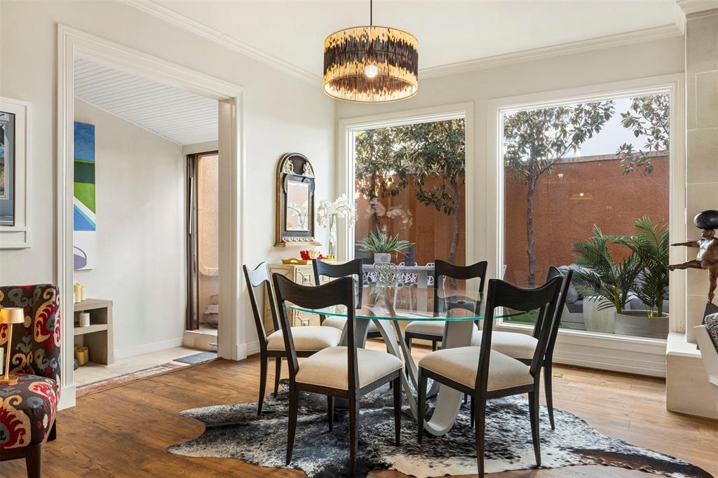 3424 Gillespie Street, Unit 5 Dallas, TX 75219 - Photo 10 of 31 a dining room with furniture and window