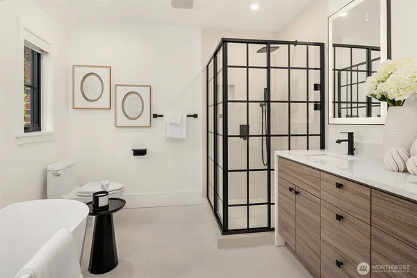 a bedroom with a bed and a couch