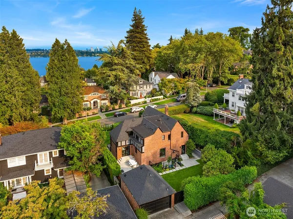an aerial view of houses with yard