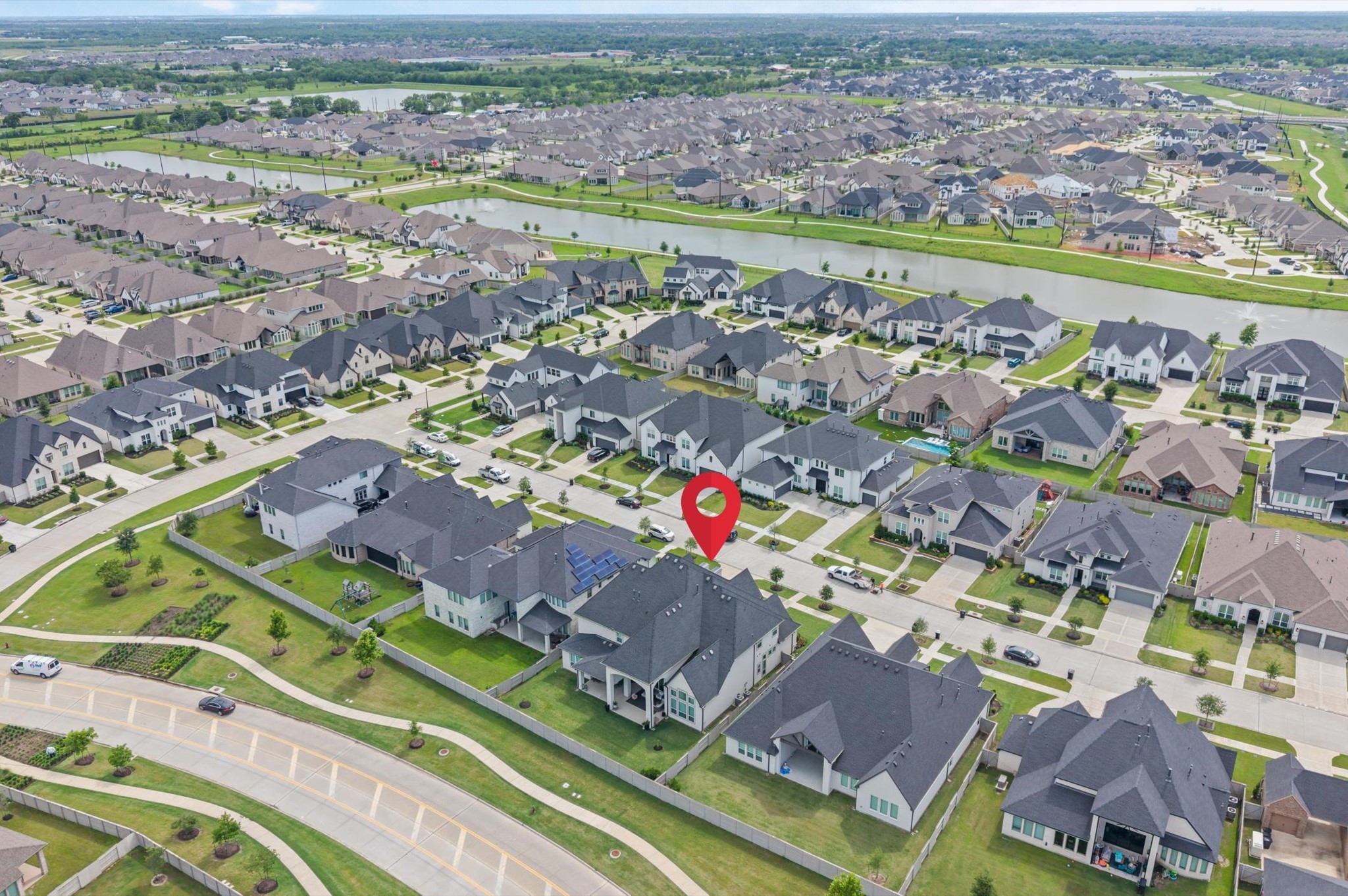 4923 Grapevine Lane Manvel, TX 77578 - Photo 49 of 49 an aerial view of a city with lots of residential buildings ocean and mountain view in back