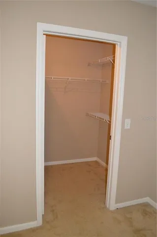 a view of a bathroom with a toilet