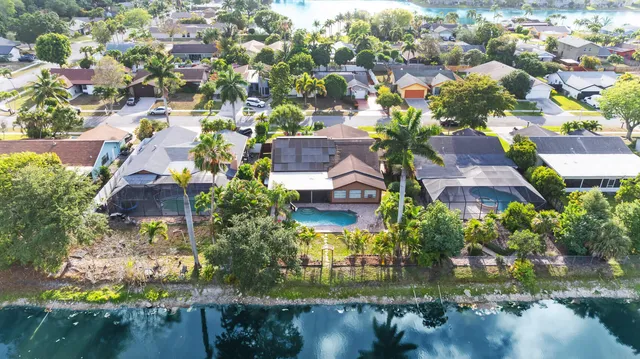 a view of houses with yard