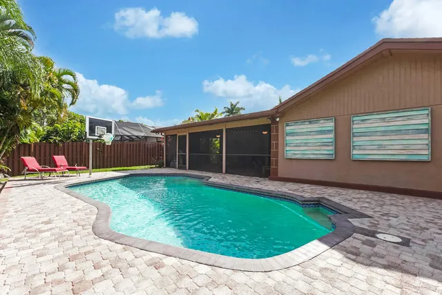 a view of a backyard with a patio