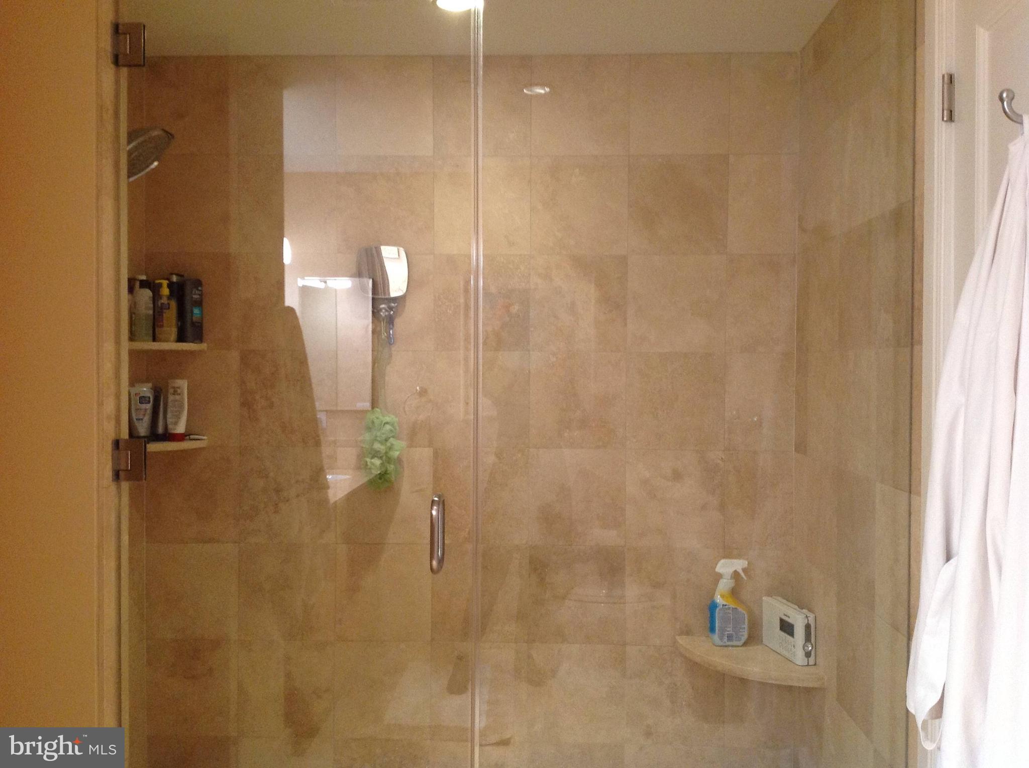 1701-15 Locust Street, Unit 1402 Philadelphia, PA 19103 - Photo 8 of 17 a bathroom with a shower