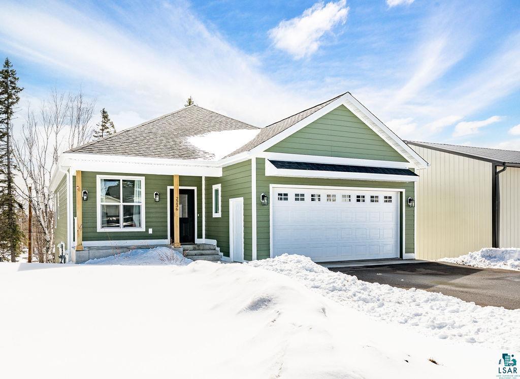 2236 Hoover Street Duluth, MN 55811 - Photo 2 of 52 View of front of home with a garage and a shingled roof