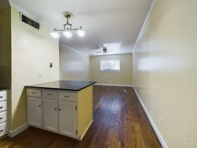 a view of a livingroom with wooden floor