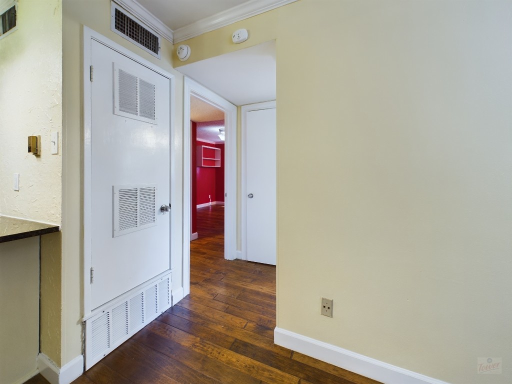 803 West 28th Street, Unit 206 Austin, TX 78705 - Photo 6 of 20 a view of a hallway with wooden floor