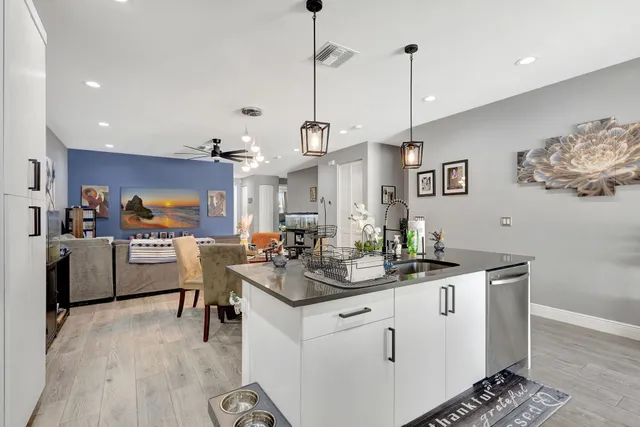 a view of living room and kitchen