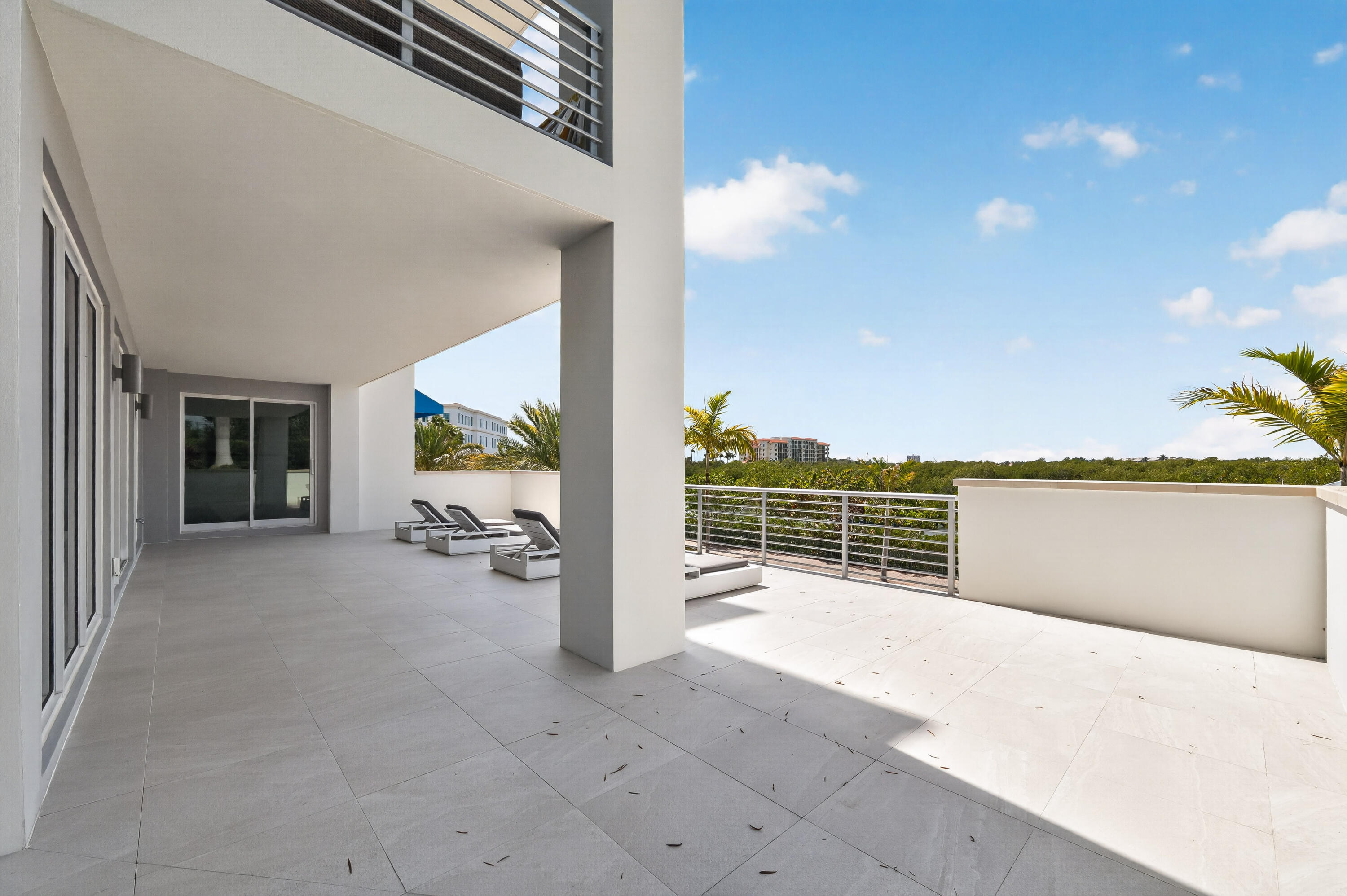 1 South Coastal Way, Unit 201 Jupiter, FL 33477 - Photo 27 of 40 a view of a room with stairs and wooden floor