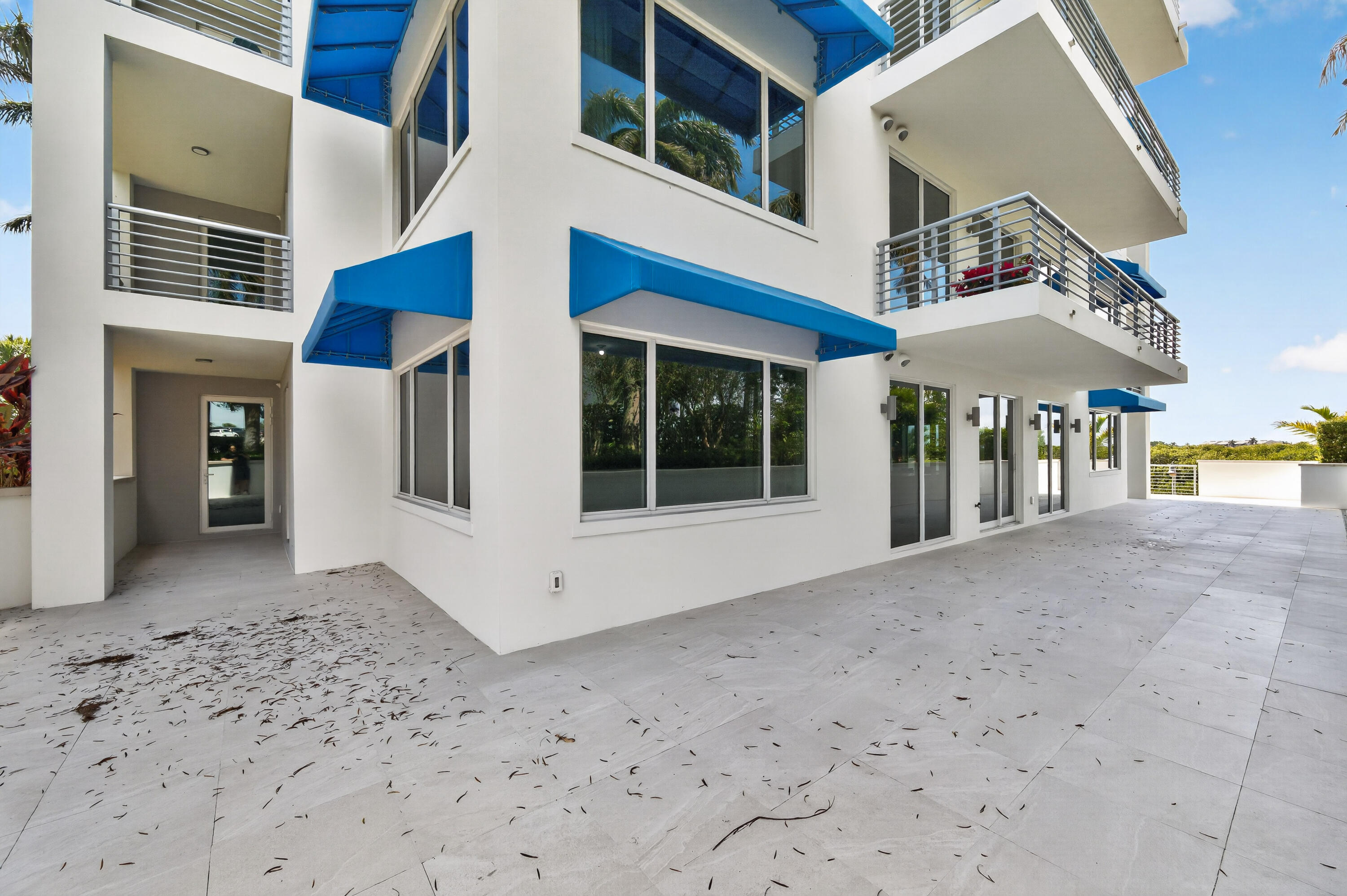 1 South Coastal Way, Unit 201 Jupiter, FL 33477 - Photo 32 of 40 a view of a building with a yard and balcony