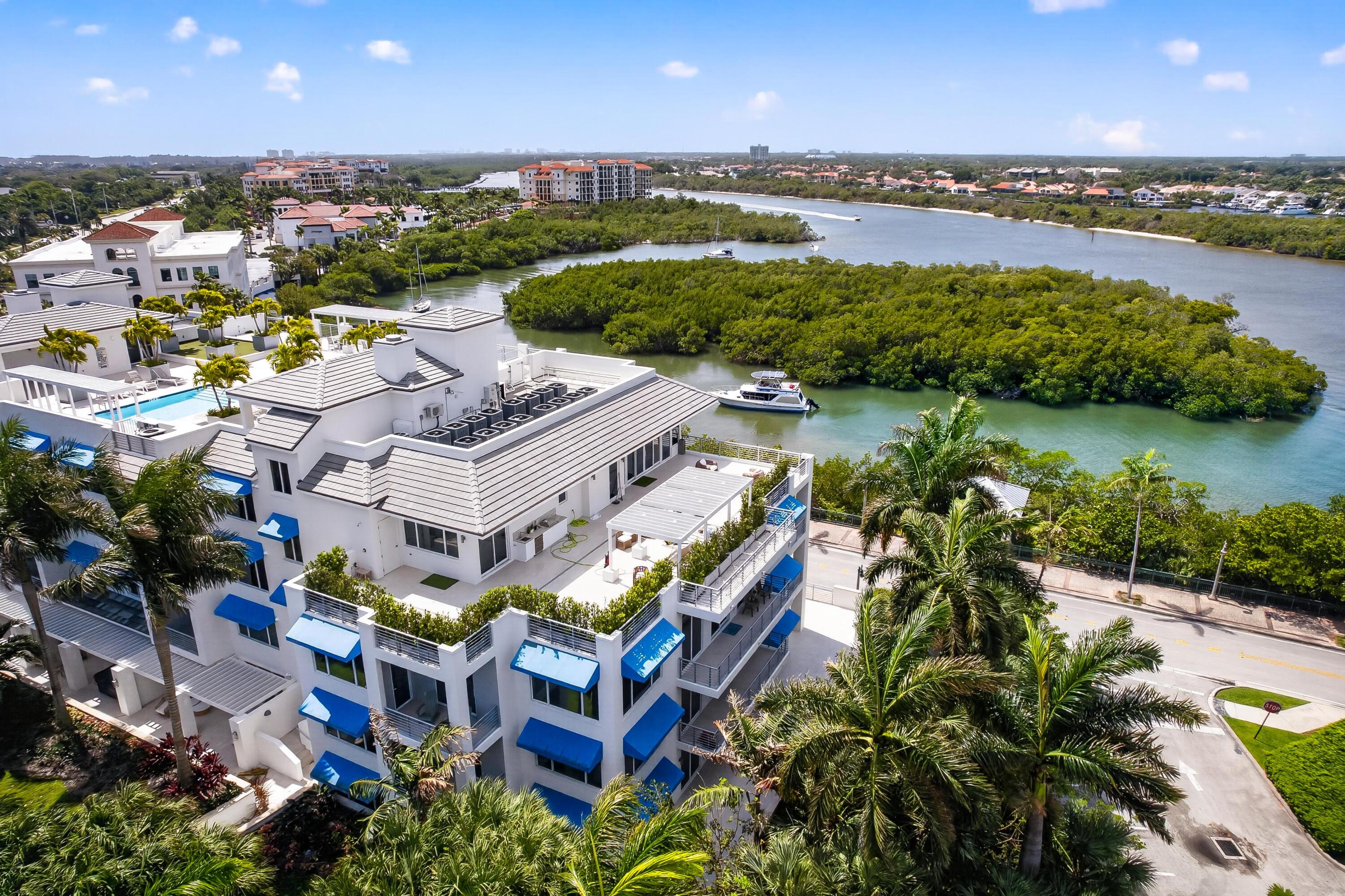1 South Coastal Way, Unit 201 Jupiter, FL 33477 - Photo 37 of 40 an aerial view of a house with a lake view and mountain view