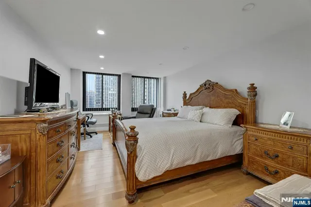 a view of a hallway with bathroom