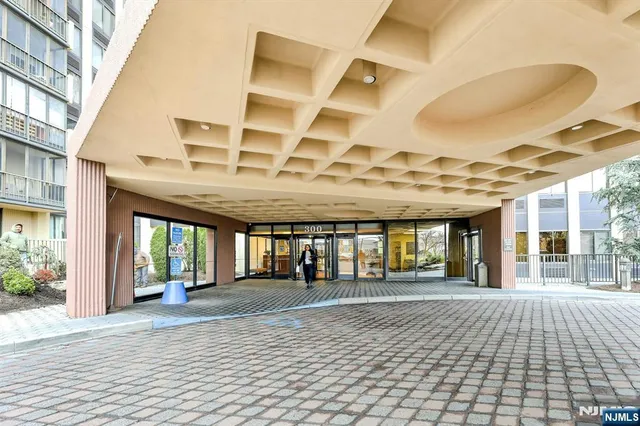 a view of balcony with wooden floor