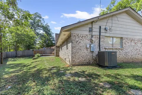 a backyard of a house with lots of green space
