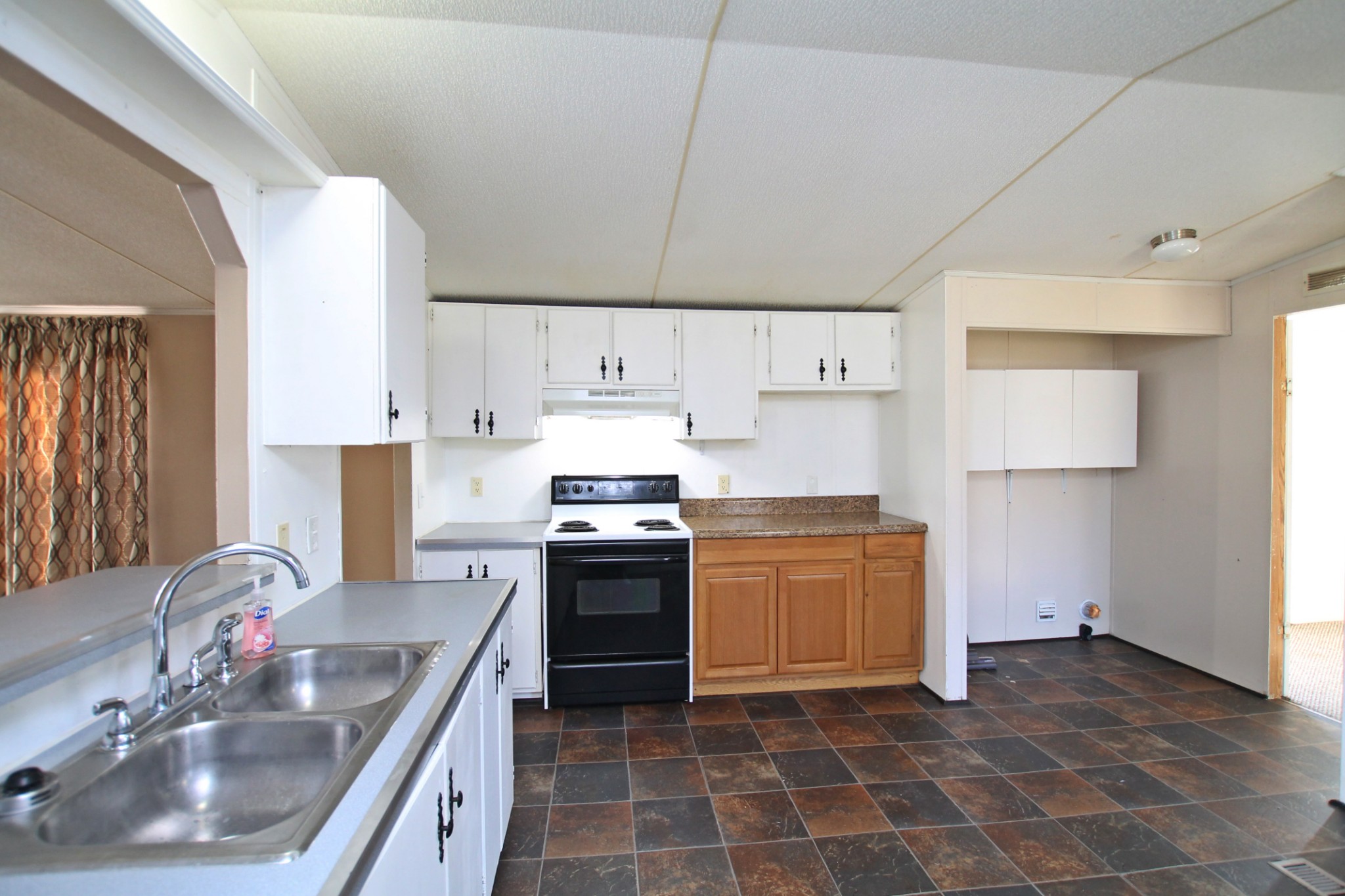 5652 Hopewell Road Springfield, TN 37172 - Photo 11 of 37 a kitchen with a sink stove and cabinets