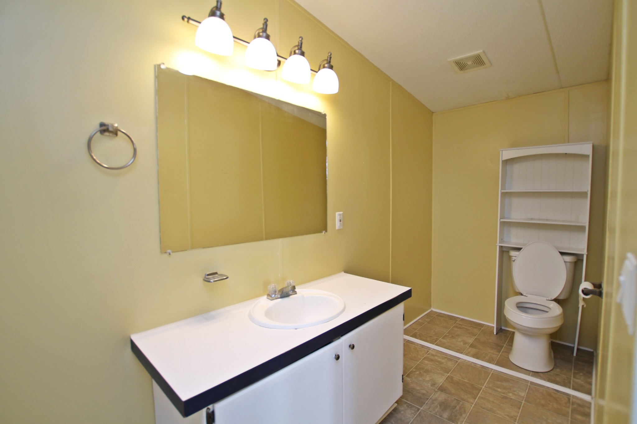 5652 Hopewell Road Springfield, TN 37172 - Photo 17 of 37 a bathroom with a sink a toilet and shower