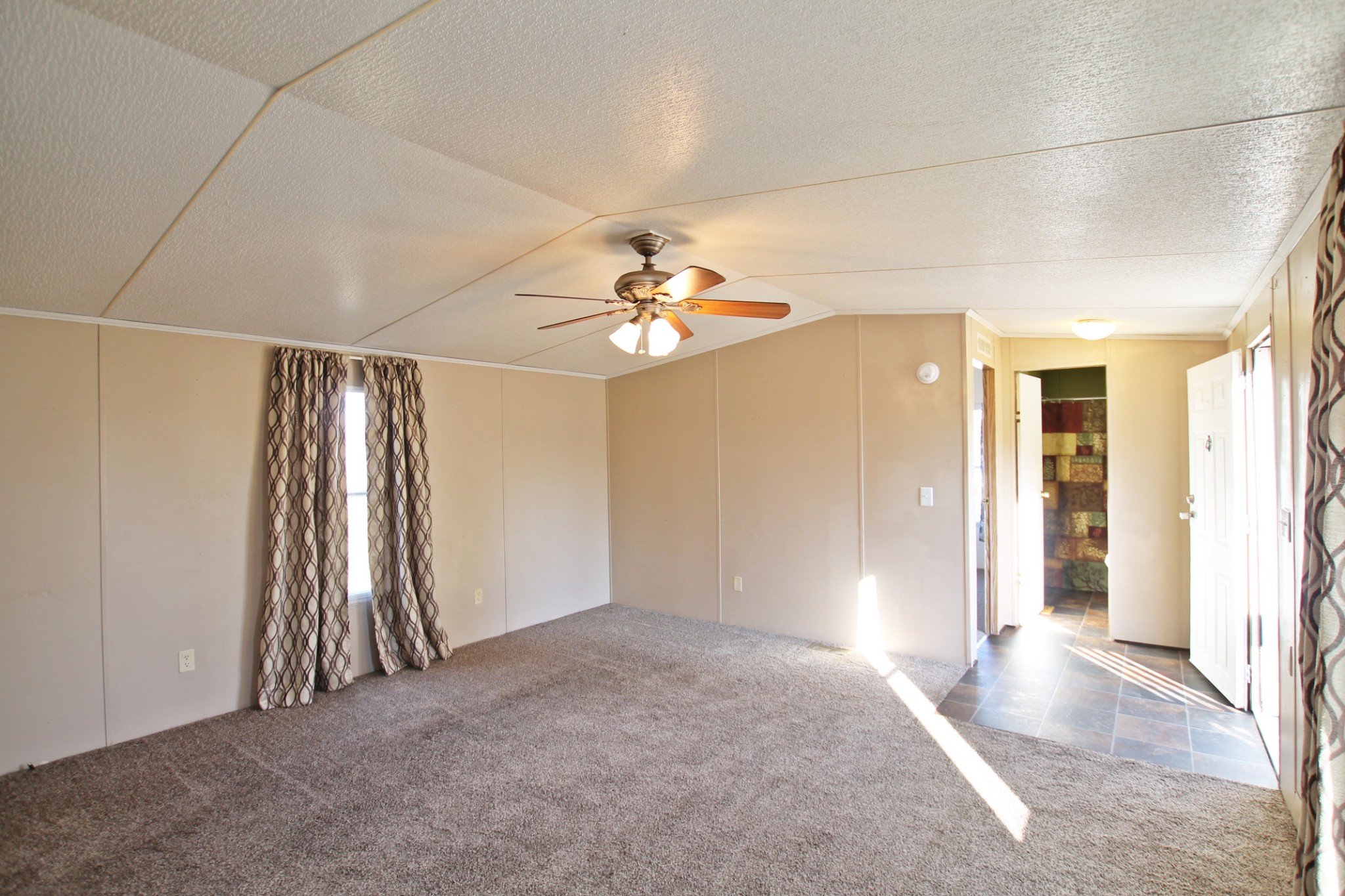 5652 Hopewell Road Springfield, TN 37172 - Photo 5 of 37 a view of a livingroom with a ceiling fan and window