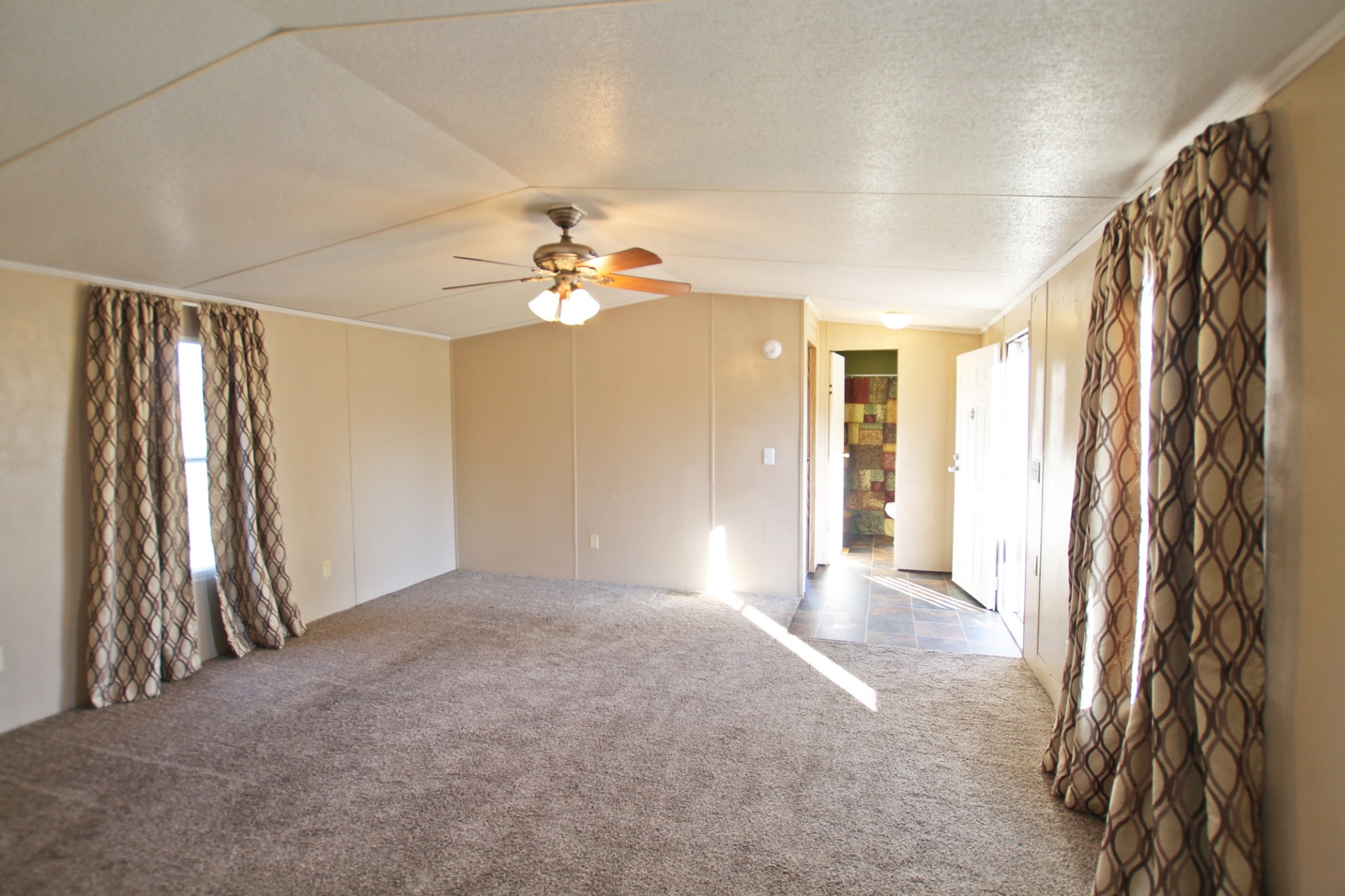 5652 Hopewell Road Springfield, TN 37172 - Photo 6 of 37 a view of an empty room with a fan