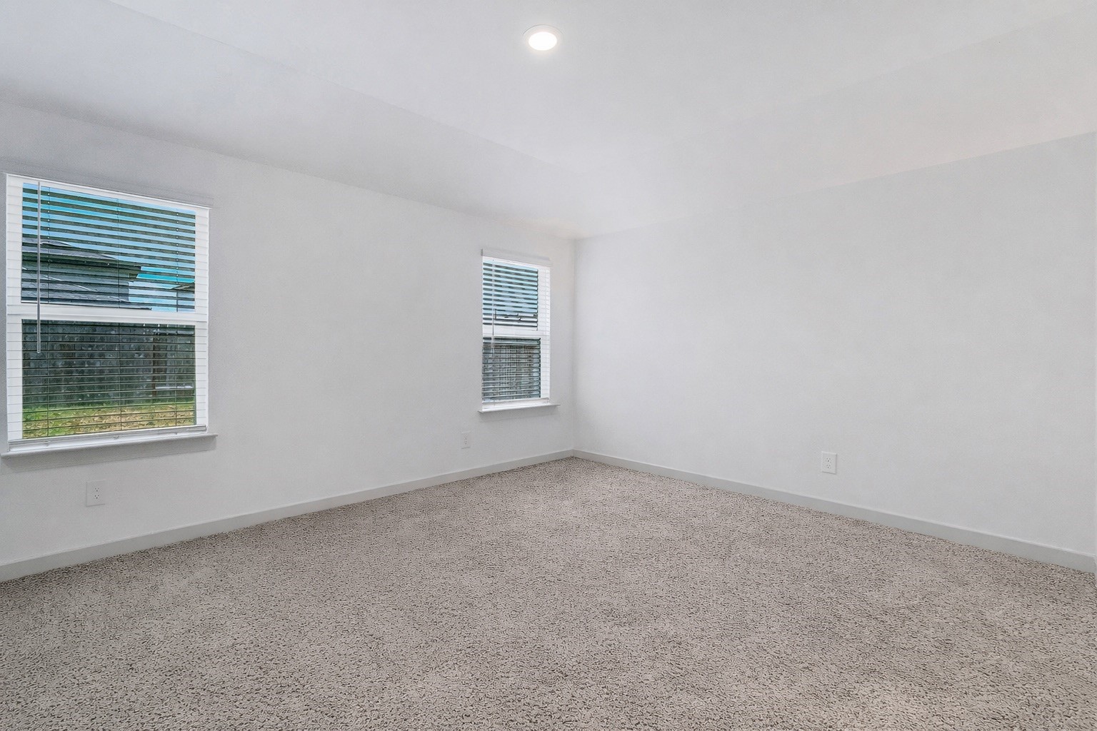 10647 Cascade Crk Drive Rosharon, TX 77583 - Photo 12 of 29 Primary bedroom nestled to the back for optimize privacy, two windows, white crisp walls
