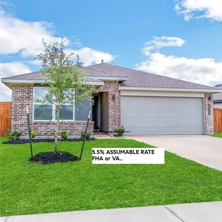 a sign that is sitting in front of a house