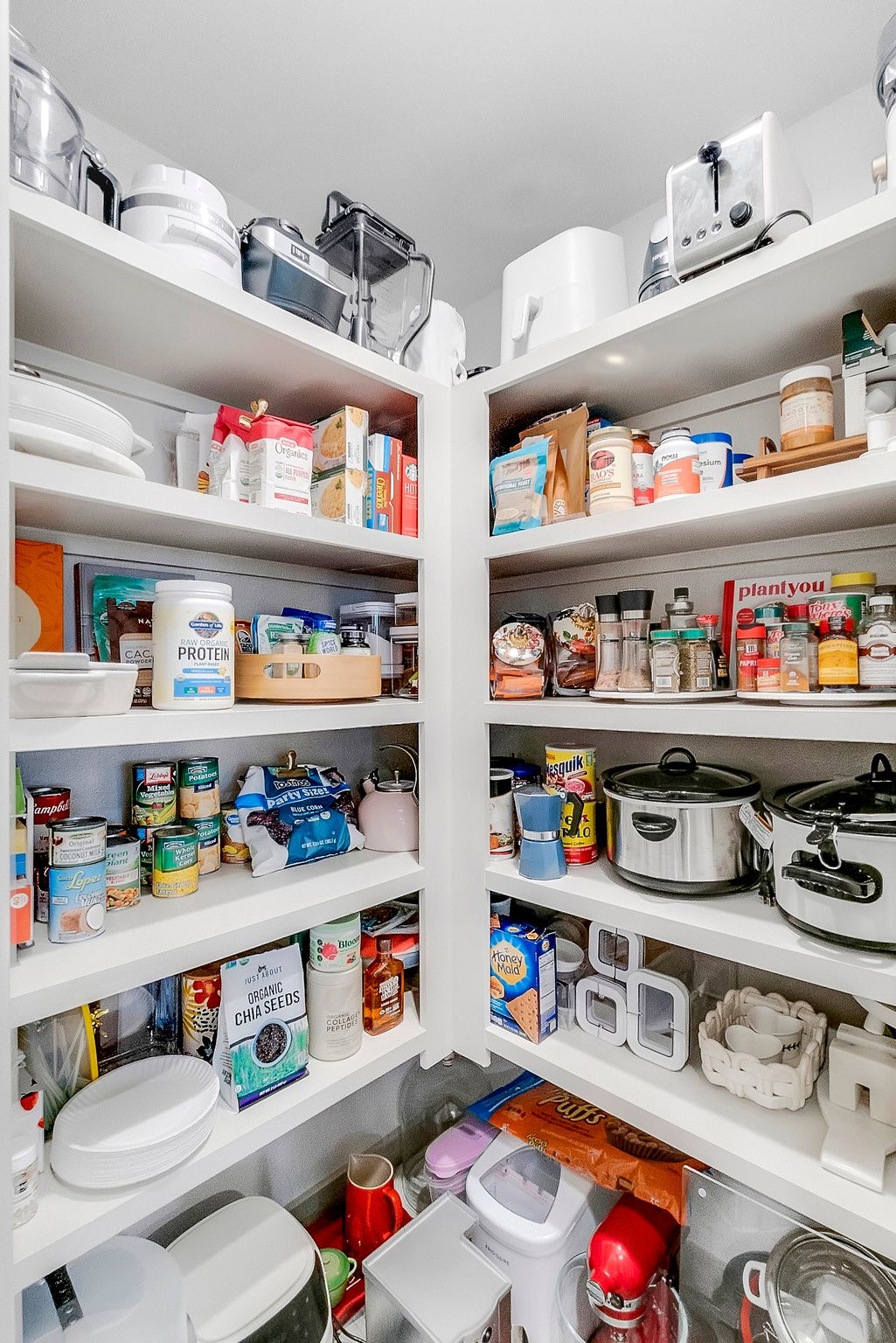 10647 Cascade Crk Drive Rosharon, TX 77583 - Photo 6 of 27 a room with stainless steel appliances lots of clutter