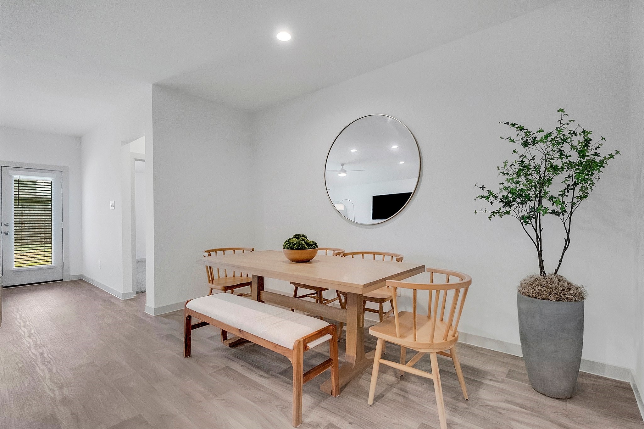 10647 Cascade Crk Drive Rosharon, TX 77583 - Photo 8 of 27 a dining room with furniture and wooden floor
