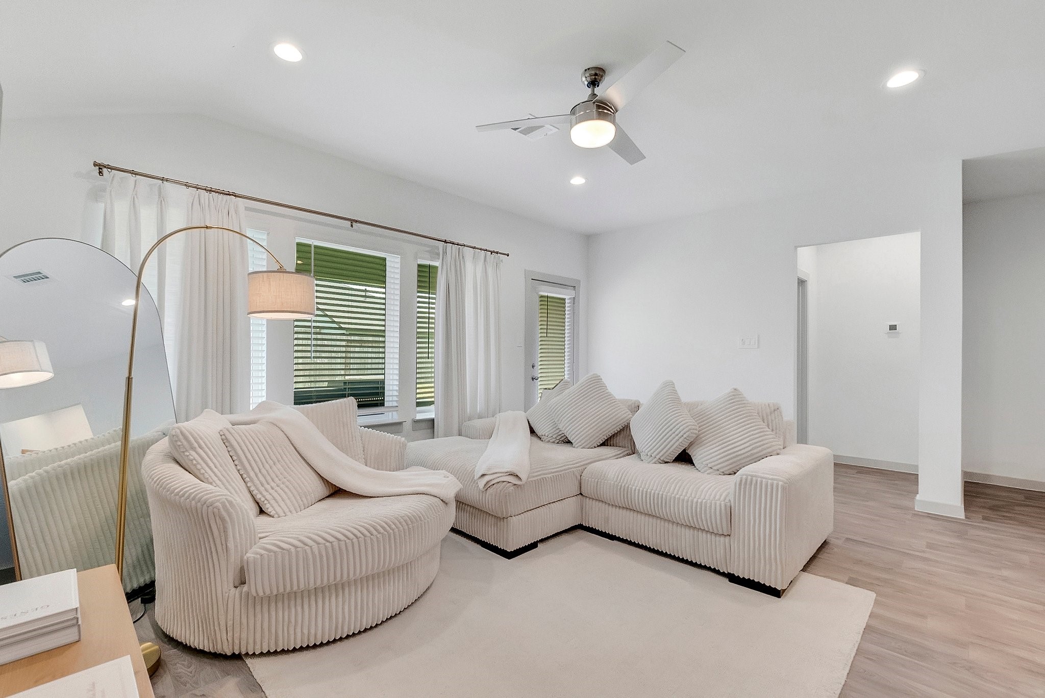 10647 Cascade Crk Drive Rosharon, TX 77583 - Photo 10 of 27 a living room with furniture and a large window