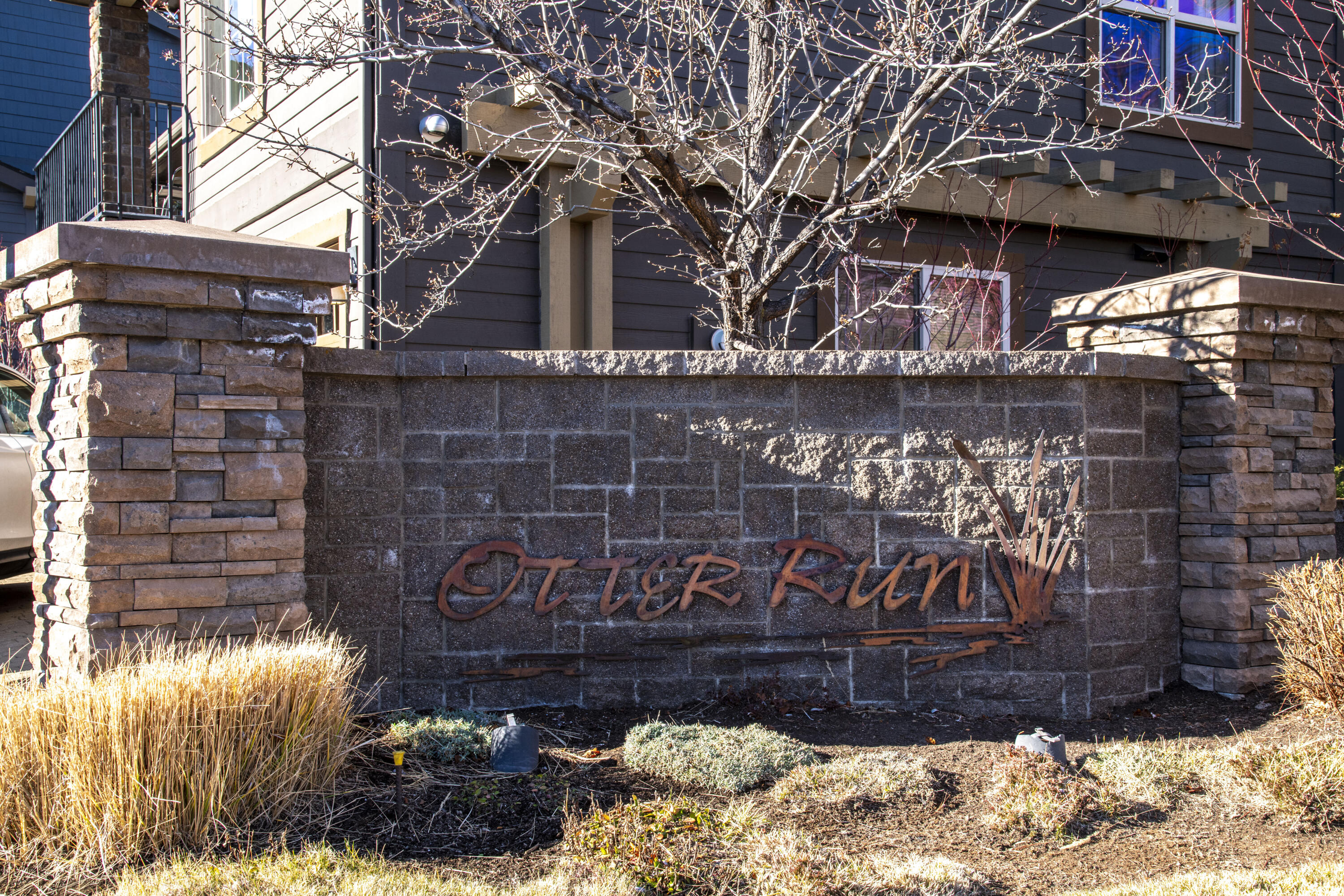 680 Southwest Otter Way Bend, OR 97702 - Photo 48 of 48 a sign on the side of a building