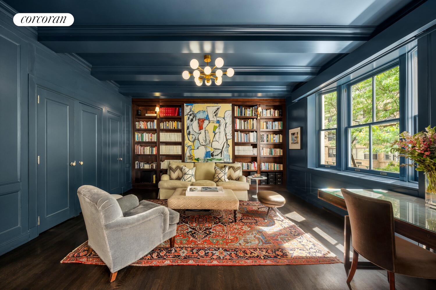 3 East 84th Street, Unit 3 Manhattan, NY 10028 - Photo 7 of 24 a living room with furniture chandelier and a large window