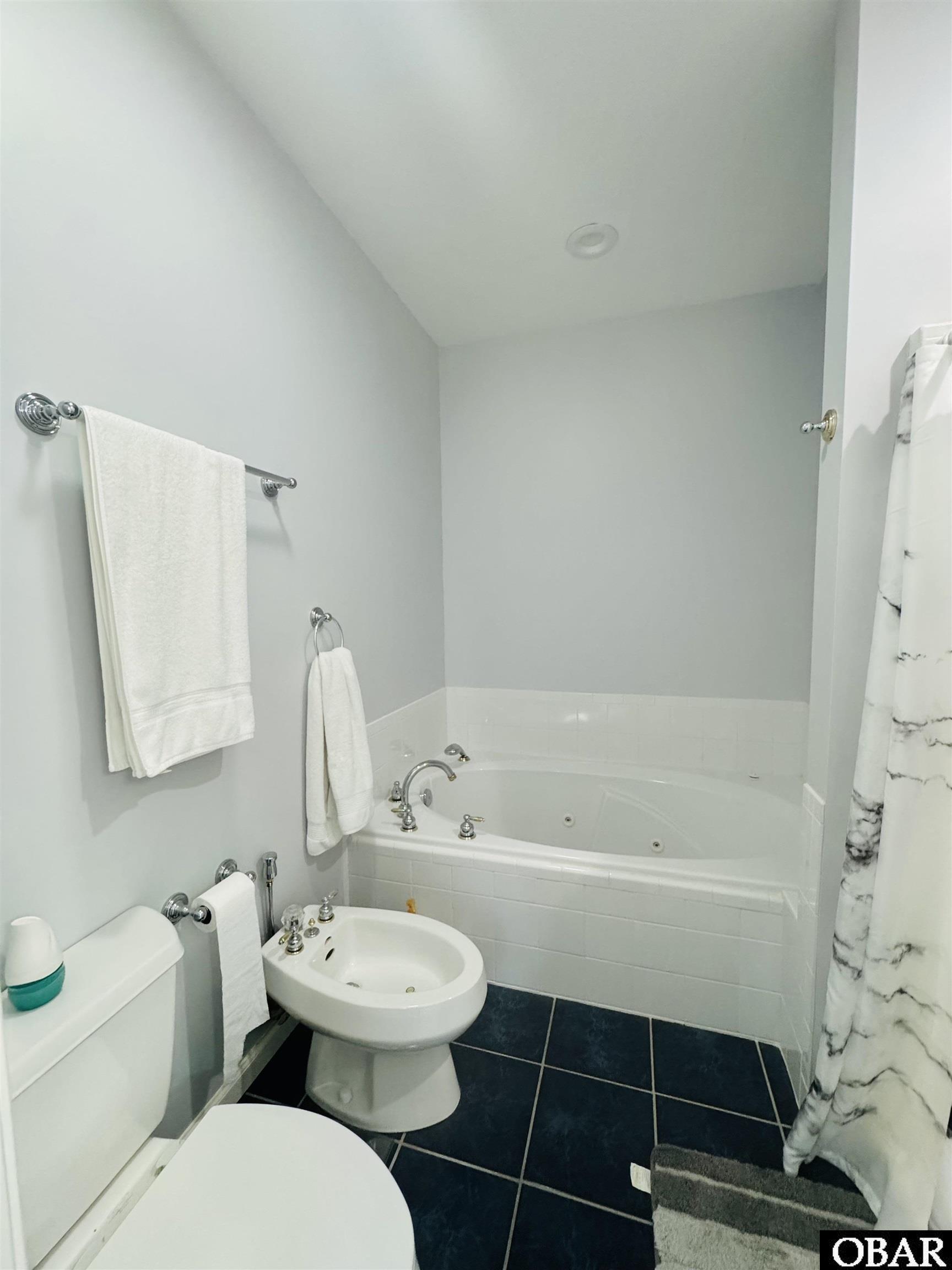 247 Grandy Road Grandy, NC 27939 - Photo 17 of 43 En-Suite Bath with tub and walk-in shower!