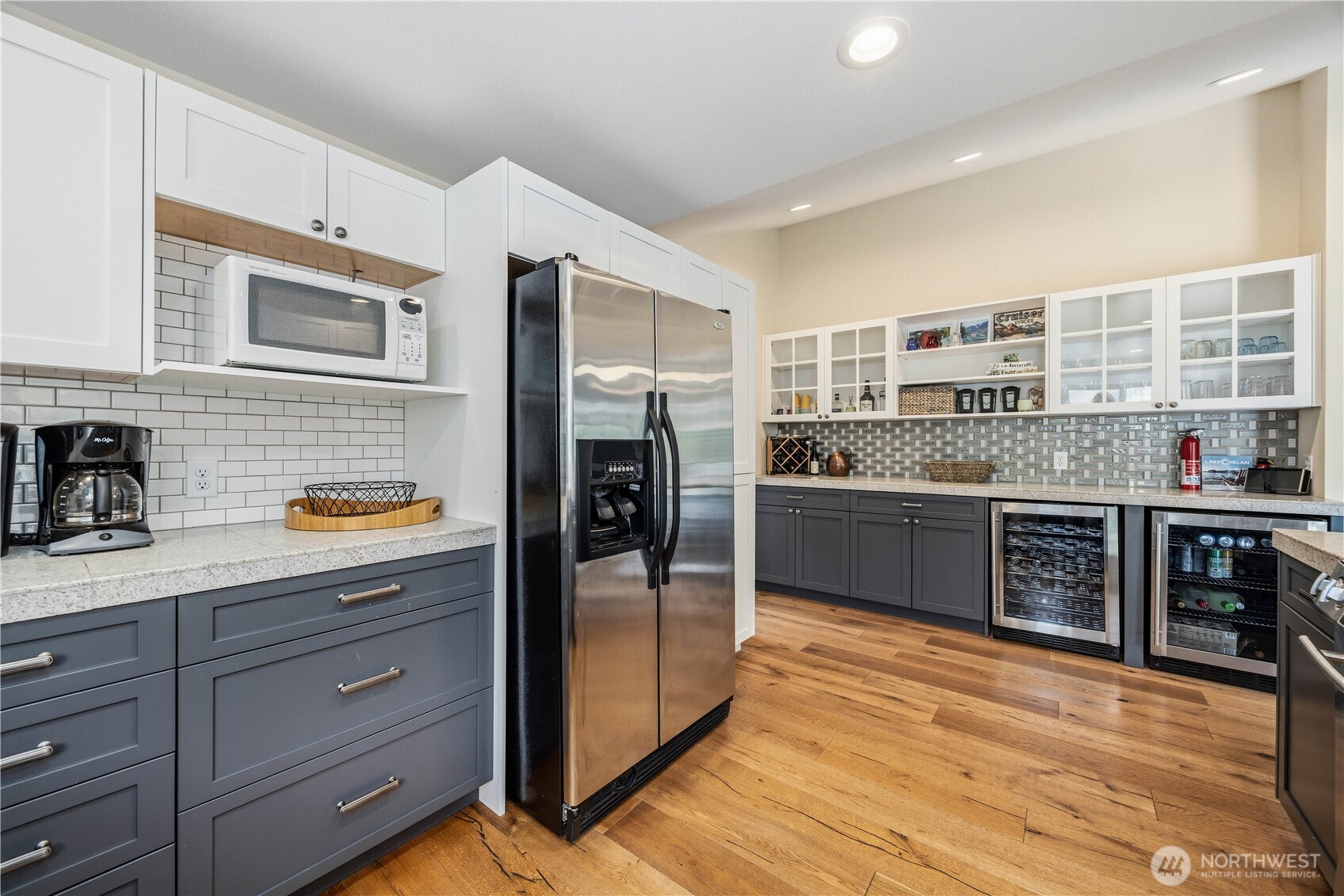 141 Sunset Place Manson, WA 98831 - Photo 10 of 38 a kitchen with stainless steel appliances granite countertop a refrigerator and stove
