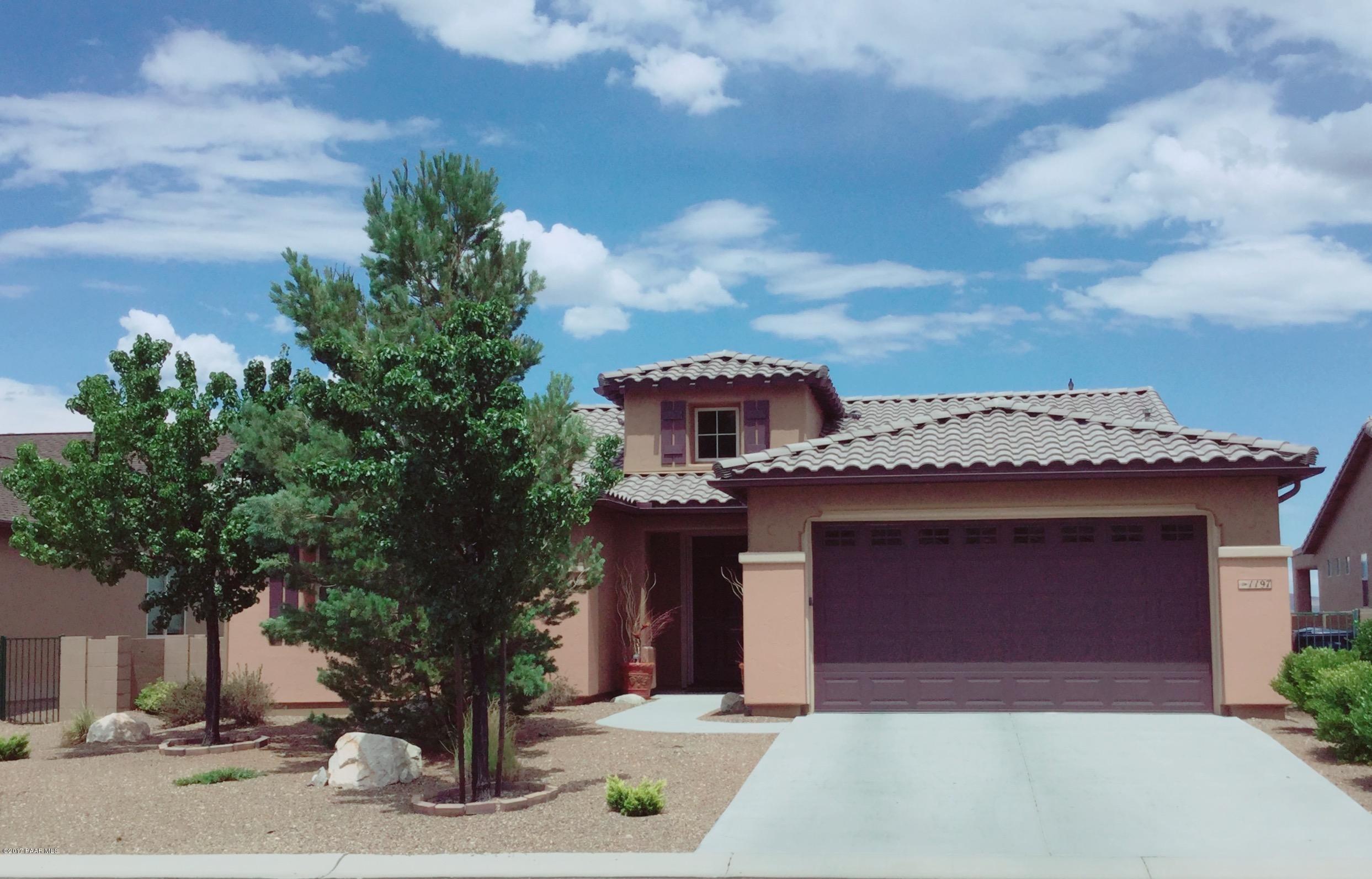 1197 Rusty Nail Road Prescott Valley, AZ 86314 - Photo 1 of 40 front view of a house with a street