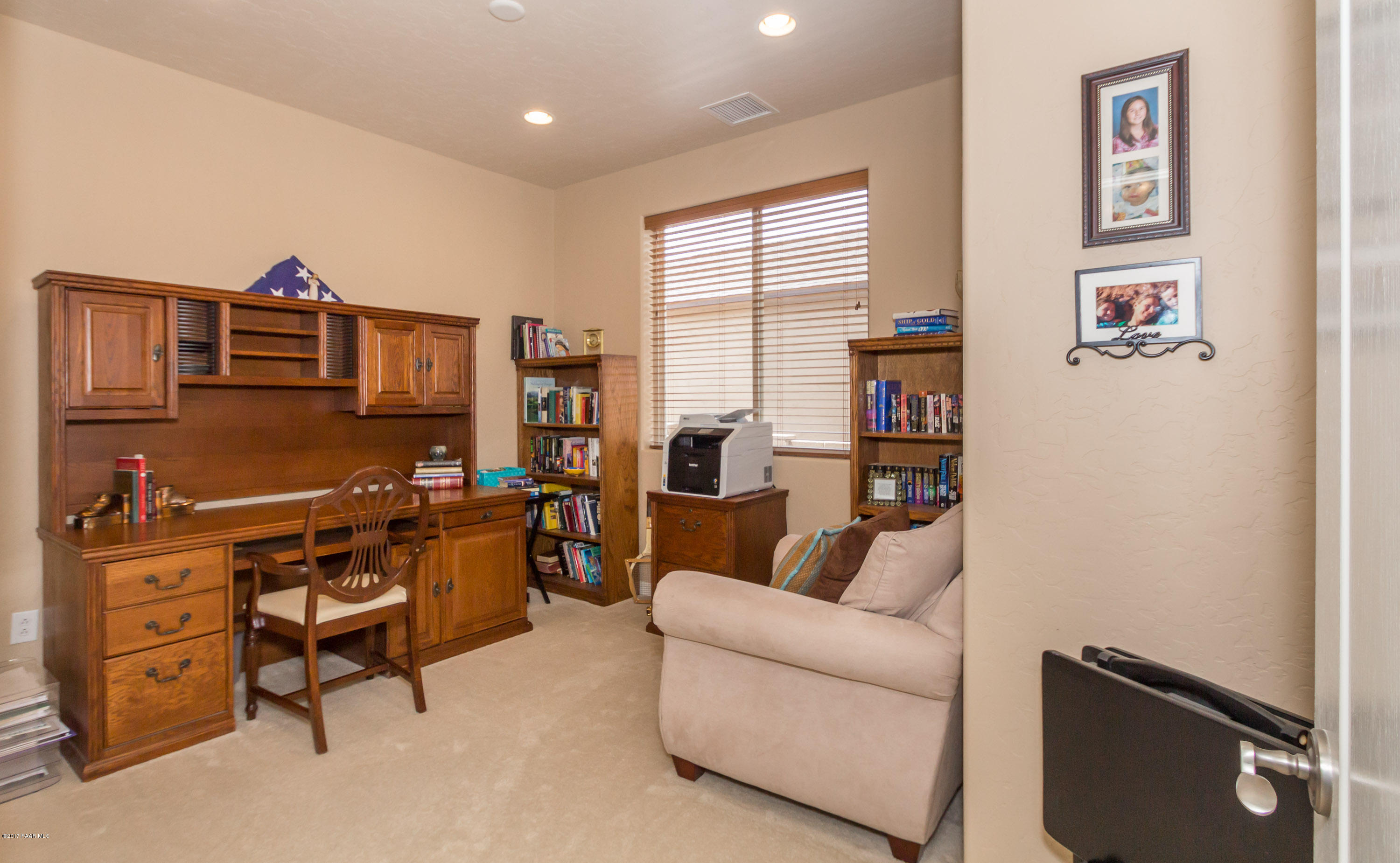 1197 Rusty Nail Road Prescott Valley, AZ 86314 - Photo 14 of 40 a view of a livingroom with furniture and window