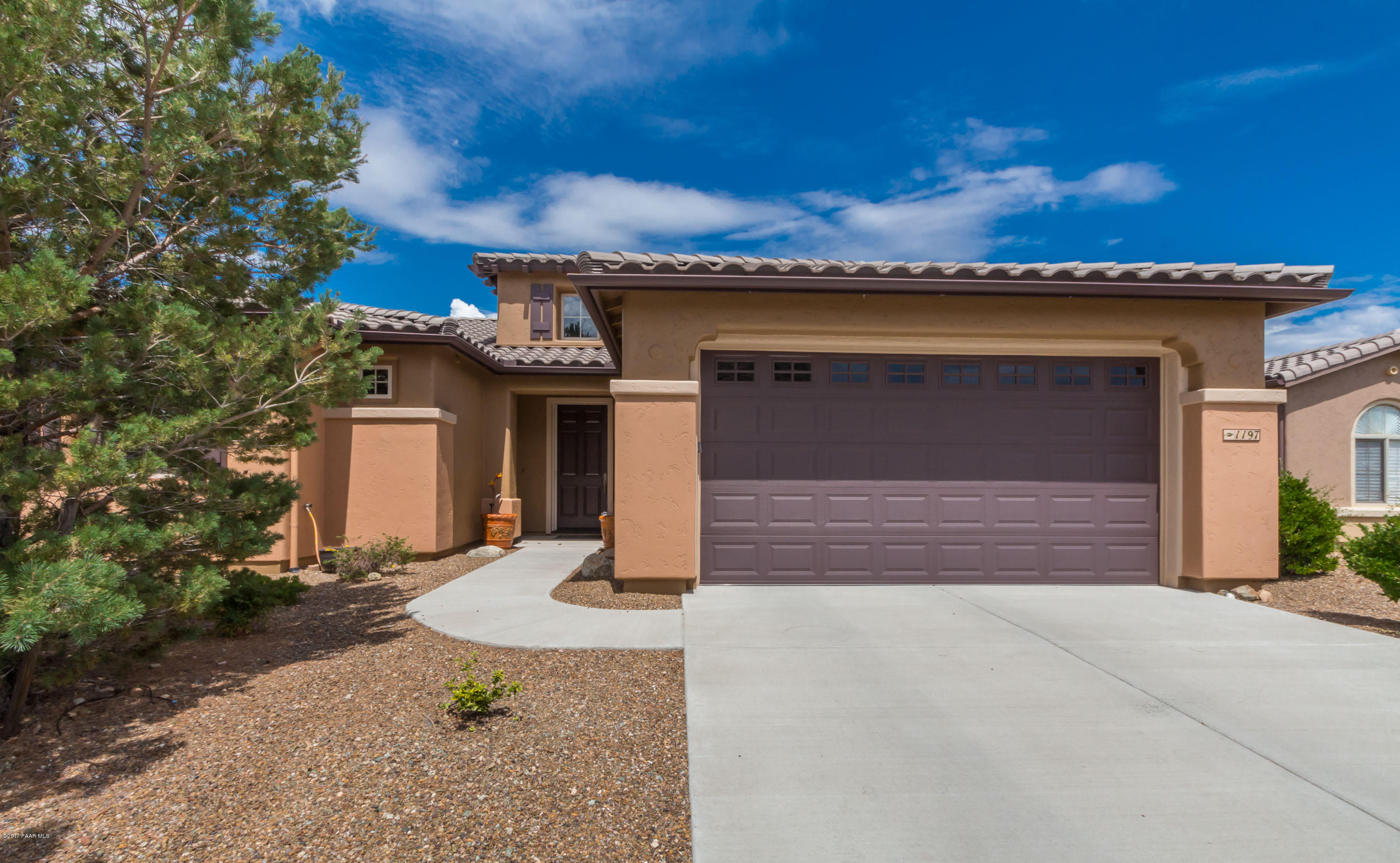 1197 Rusty Nail Road Prescott Valley, AZ 86314 - Photo 2 of 40 front view of a house with a garage
