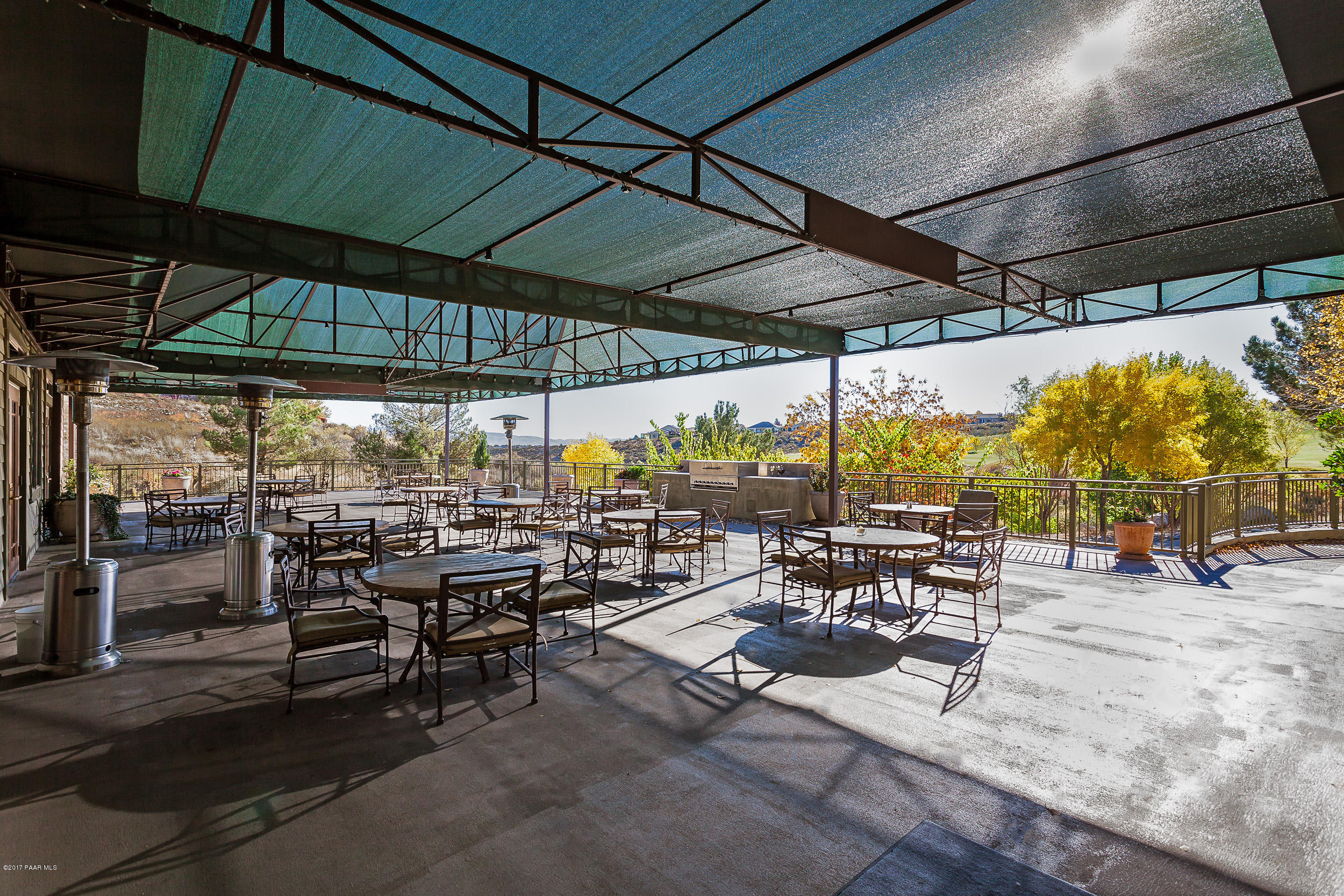 1197 Rusty Nail Road Prescott Valley, AZ 86314 - Photo 23 of 40 a view of chairs and tables in the patio