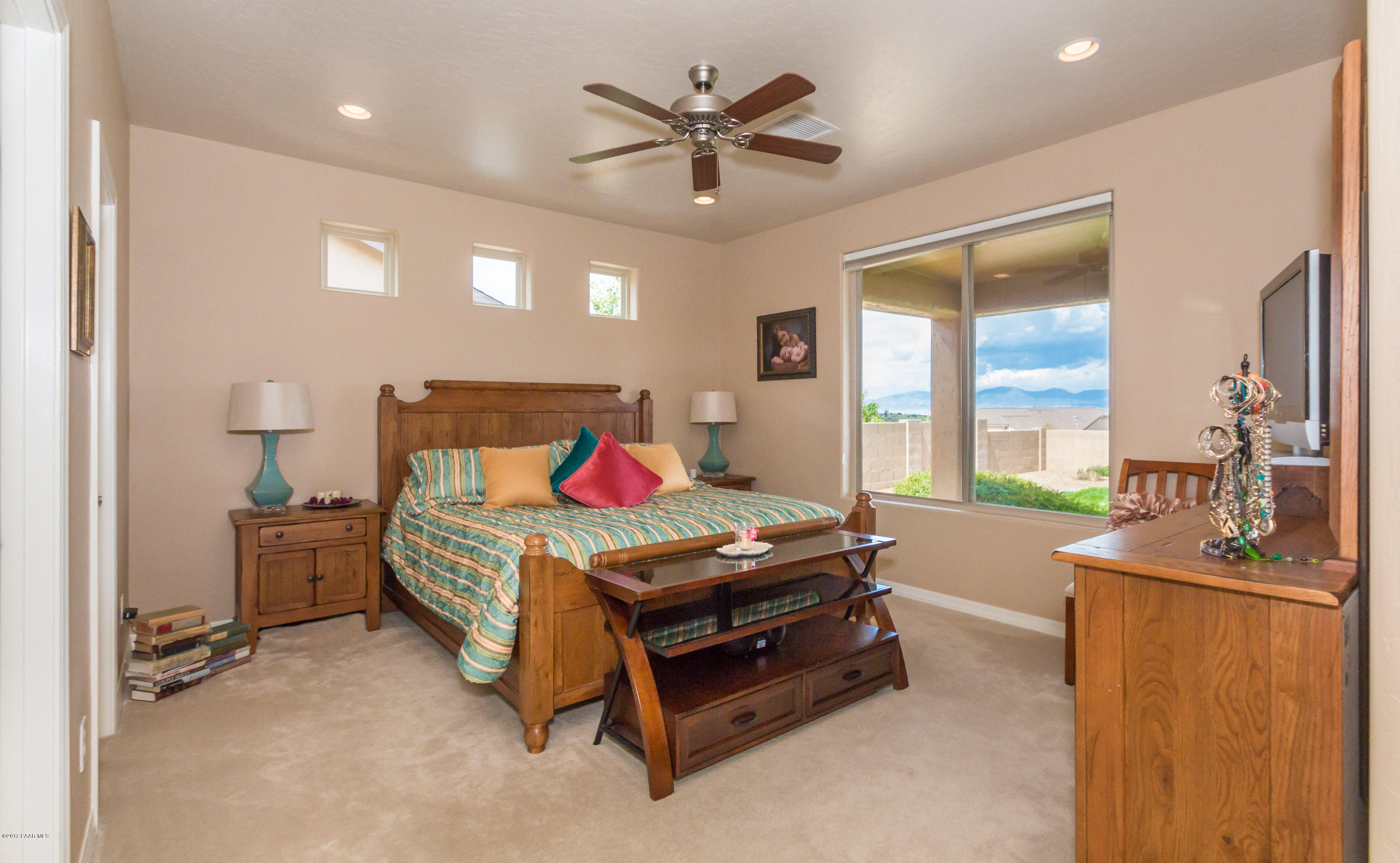 1197 Rusty Nail Road Prescott Valley, AZ 86314 - Photo 9 of 40 a room with furniture and a chandelier