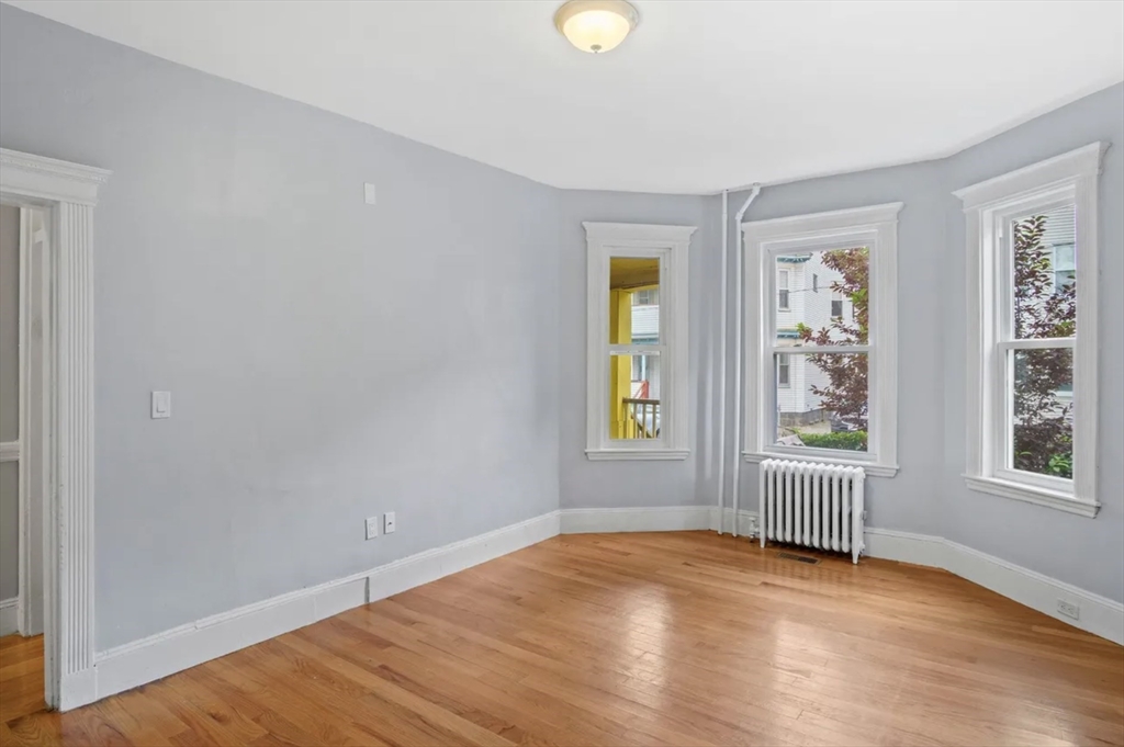 52 Intervale Street Boston, MA 02121 - Photo 13 of 16 an empty room with windows