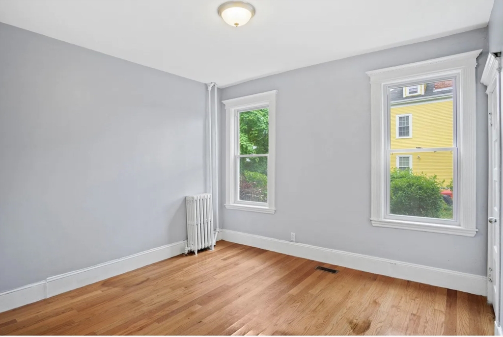 52 Intervale Street Boston, MA 02121 - Photo 16 of 16 an empty room with a window