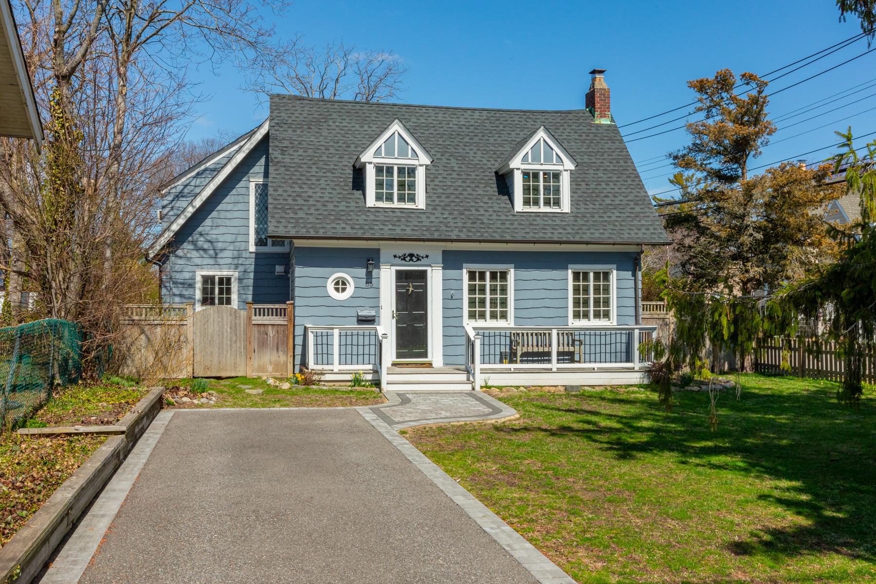 85 George Street Babylon, NY 11702 - Photo 1 of 1 a front view of a house with a yard
