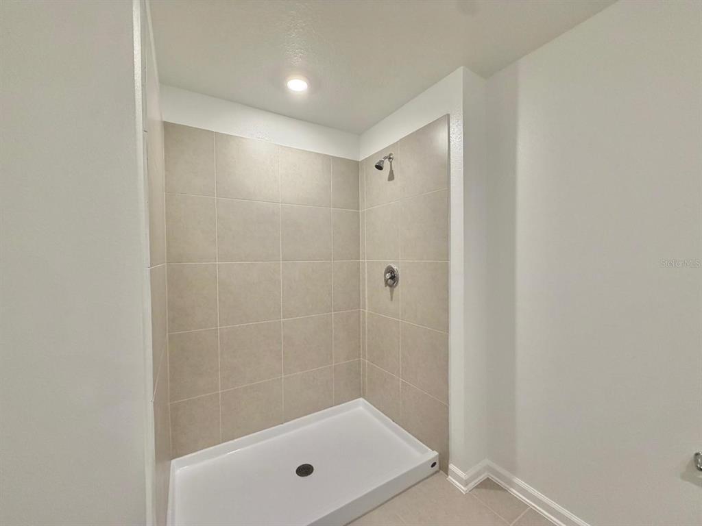 2764 Lookout Rdg Road Haines City, FL 33844 - Photo 19 of 21 a bathroom with a shower