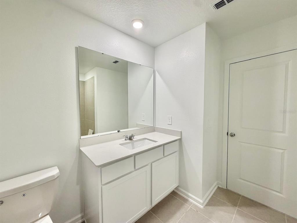 2764 Lookout Rdg Road Haines City, FL 33844 - Photo 20 of 21 a bathroom with a sink toilet and shower
