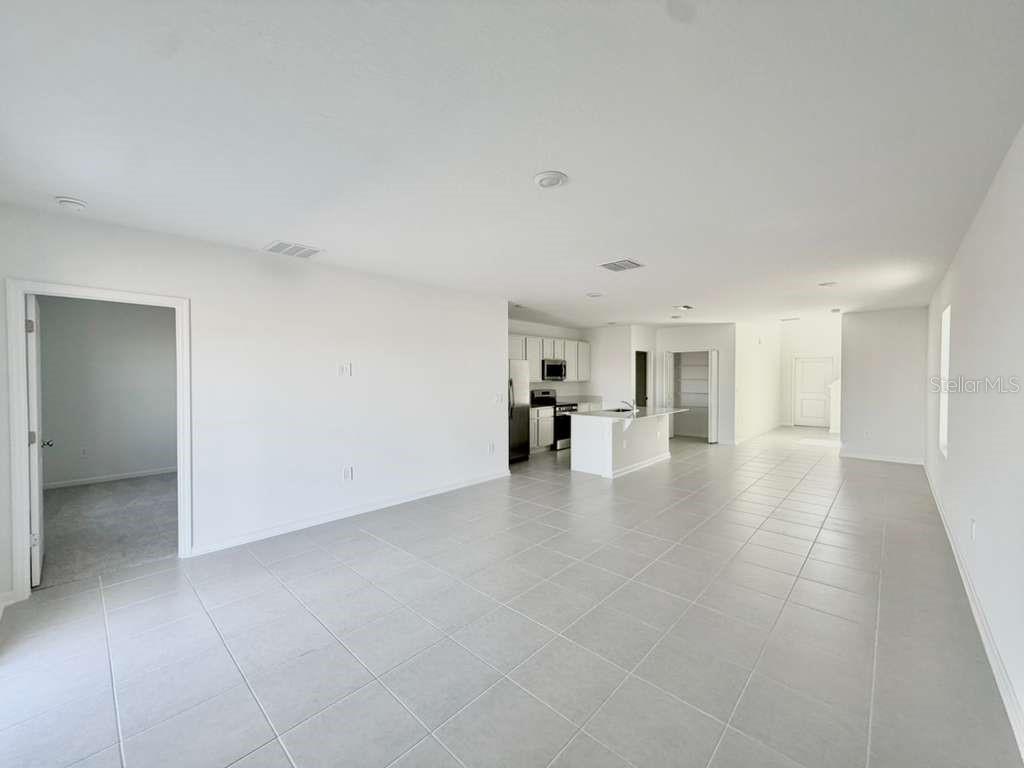 2764 Lookout Rdg Road Haines City, FL 33844 - Photo 4 of 21 a view of a livingroom with a kitchen