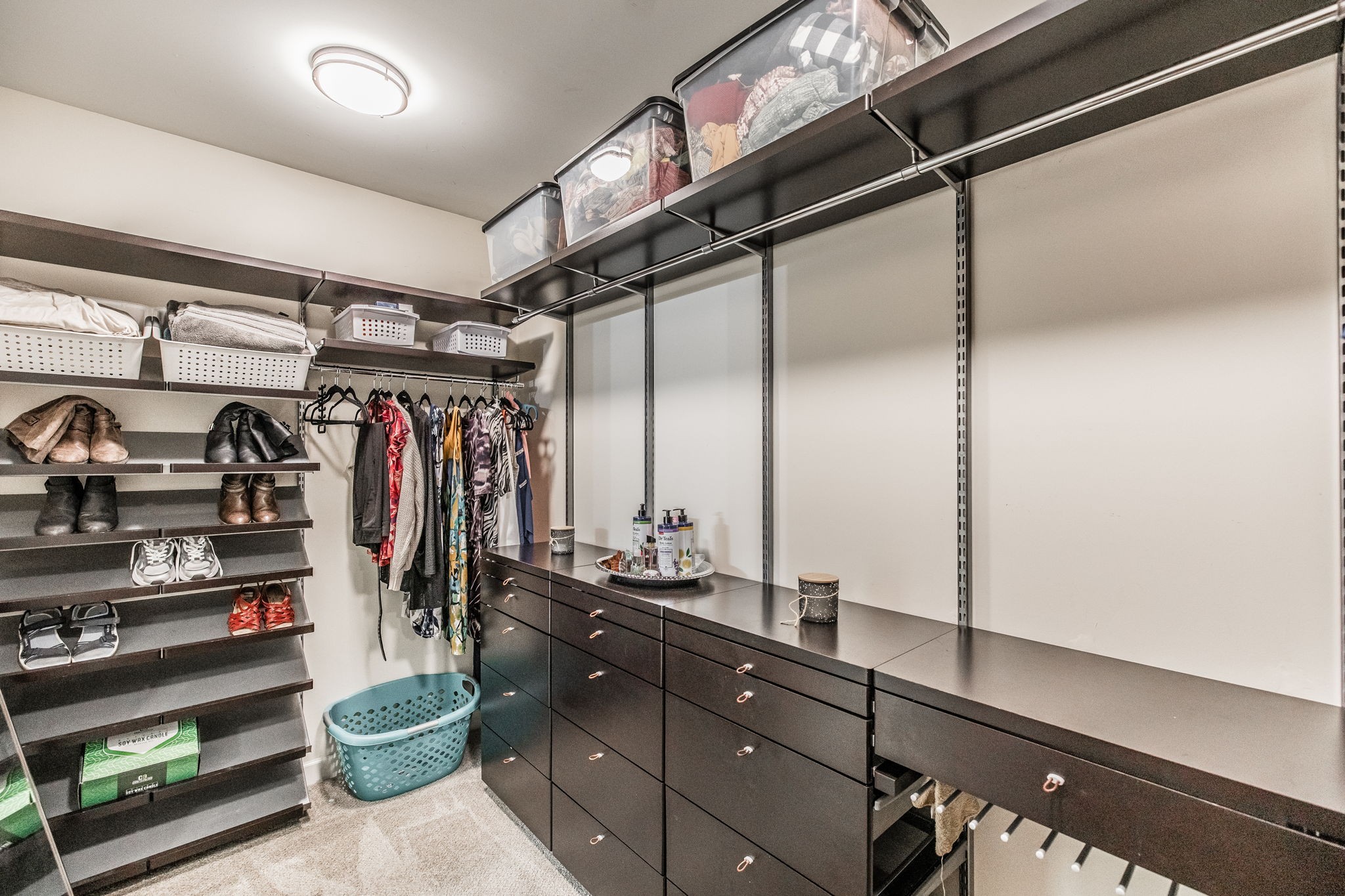 2860 Morgan Road Joelton, TN 37080 - Photo 22 of 45 a view of walk in closet with clothes and shoes